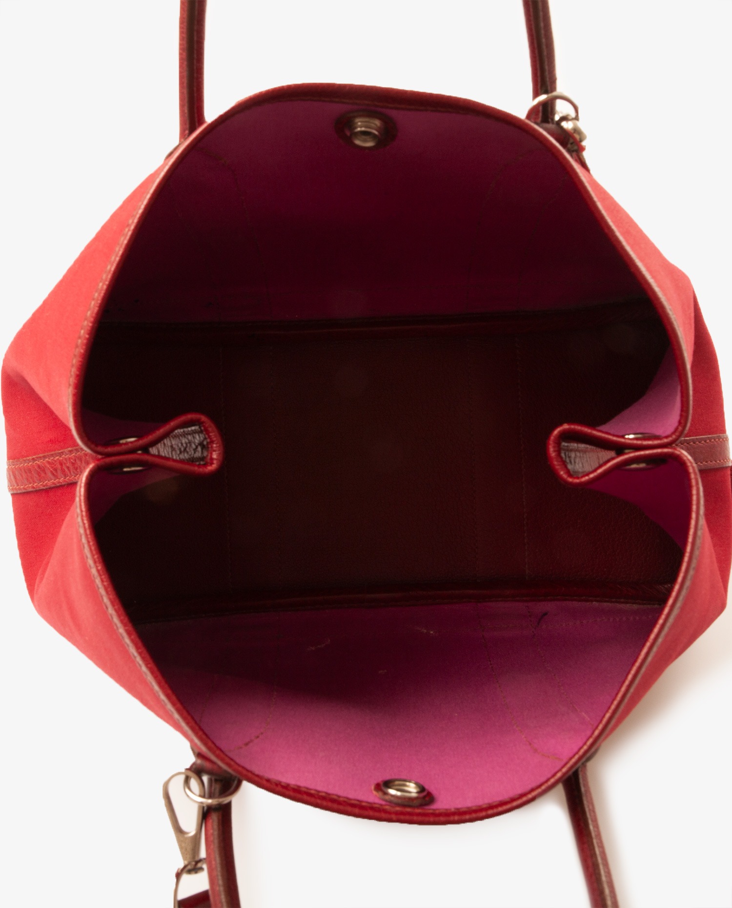 Sac Garden party Hermès toile et cuir bordeaux vue de l'intérieur